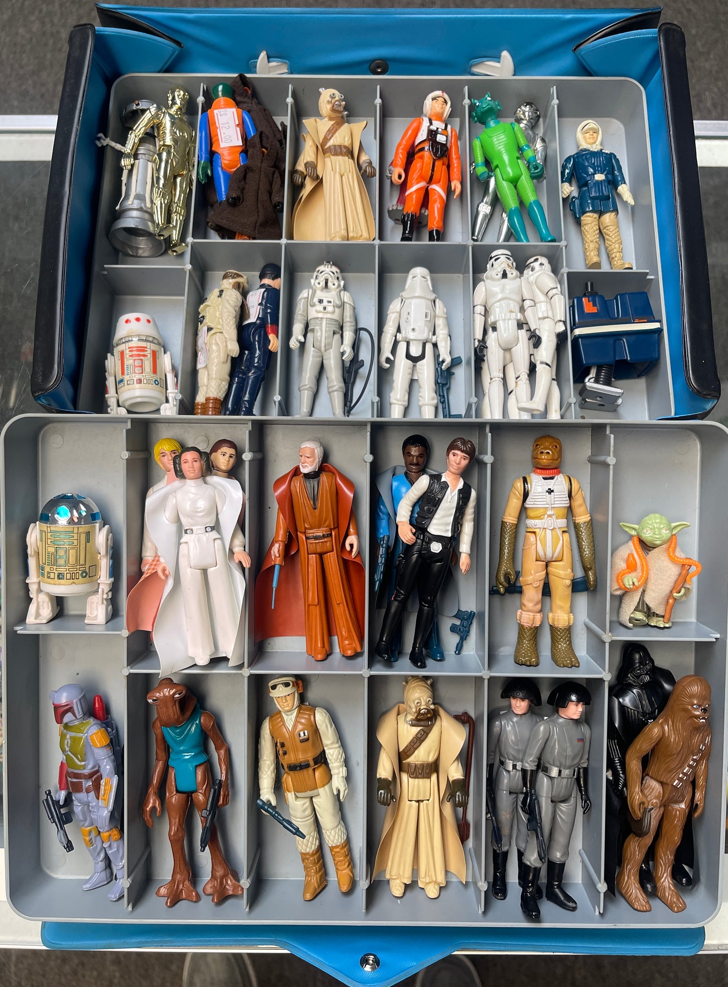 39-1977 to 1980 vintage Star Wars figures with original 1978 figure carrying case.